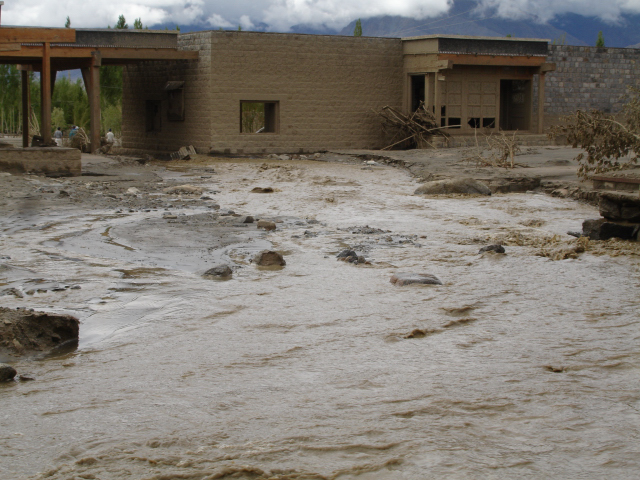 The administration courtyard|<b>The mud reached the roof on the wall nearest to the school entrance</b>