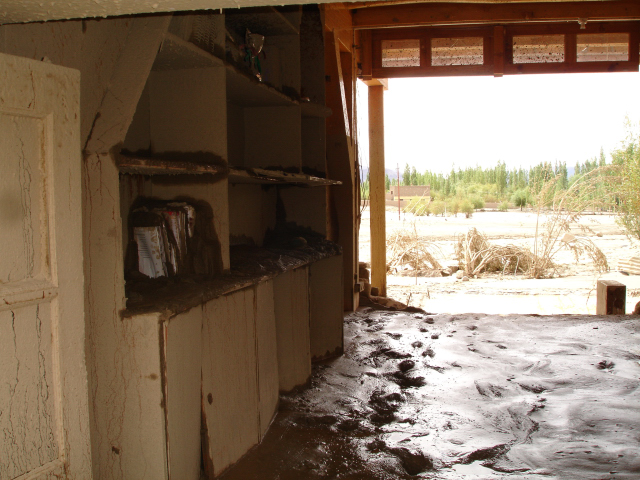 The principal's office|<b>The mudslide tore away the timber leading to the assembly courtyard</b>