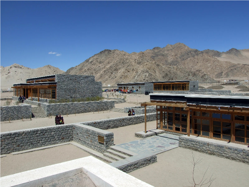 Local sone used for consruction comes from the mountain in background|Local sone used for consruction comes from the mountain in background